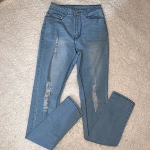 Light blue distressed jeans